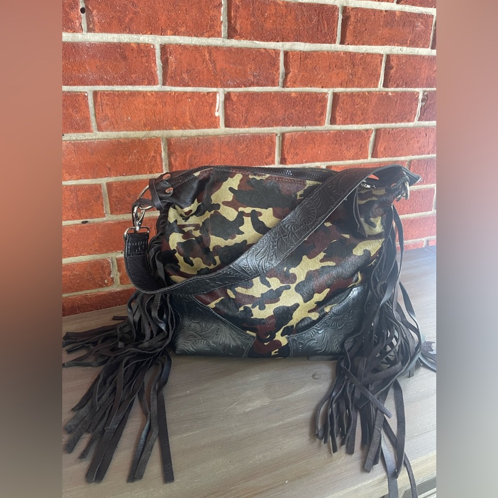 Gun Slinging Gypsies leather bag with fringe. Made in Texas